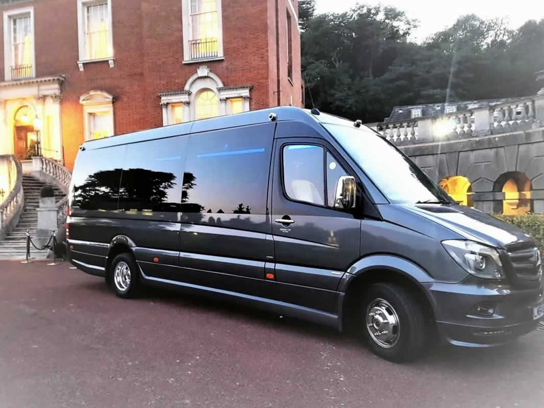16-seat Mercedes minibus driver side view
