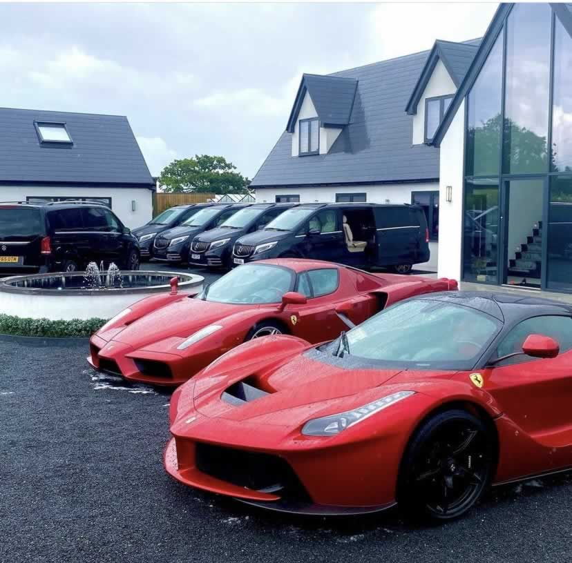 Two different red Ferraris lined up at our London bae.