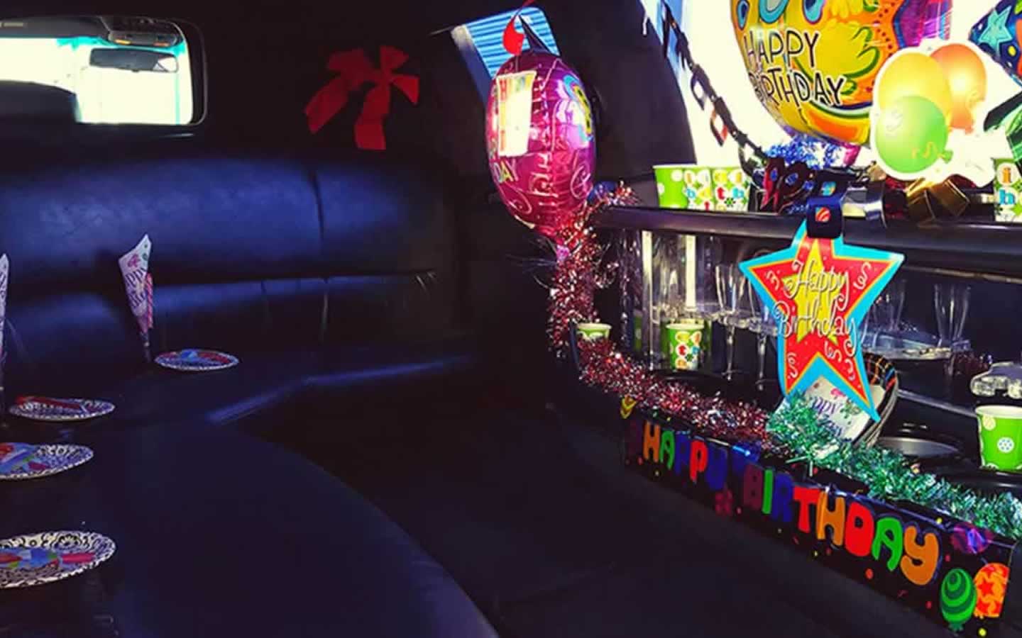 kids limo party limo interior decorated with balloons and more