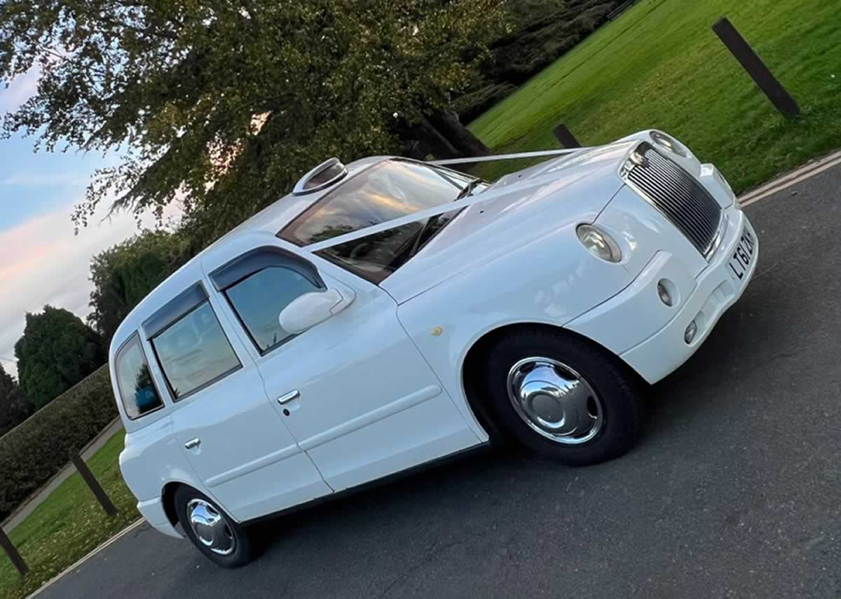 White London Taxi TX4 wedding car