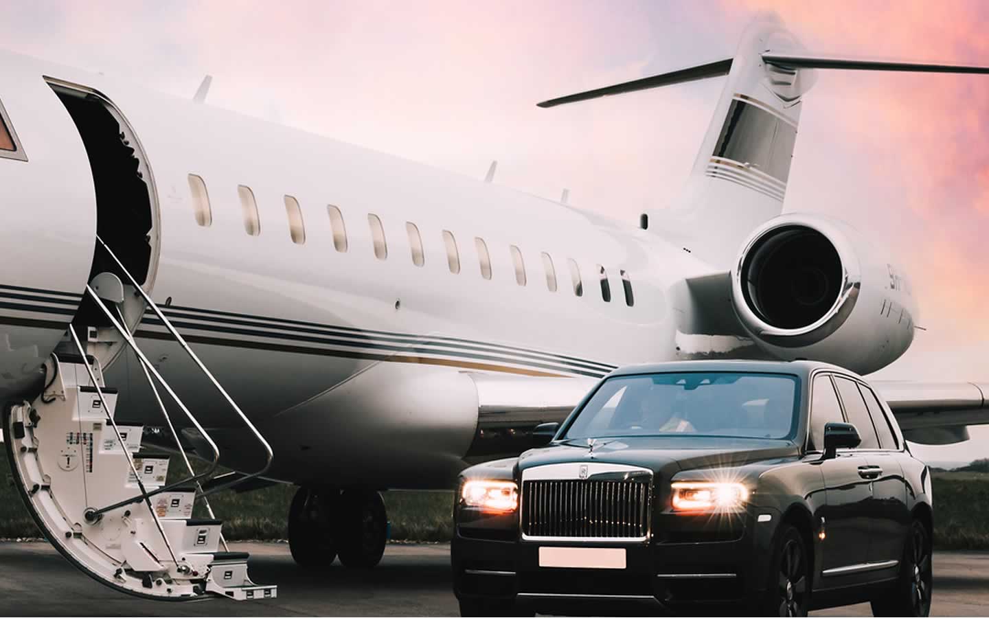 Rolls-Royce Cullinan beside a rivate jet airside